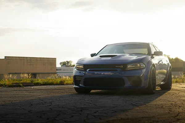 Blue Dodge Charger Scat Pack parked in lot